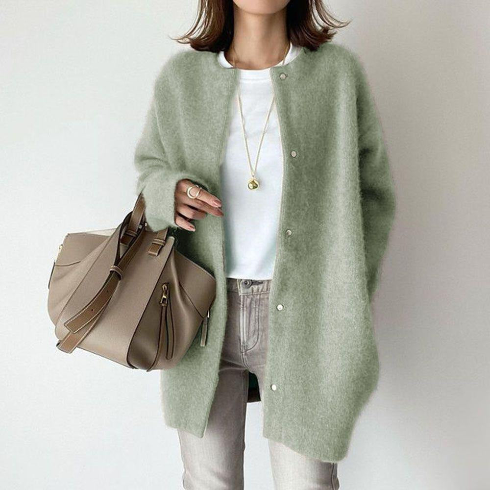 Hauteloom soft green cardigan featuring button closure, perfect for stylish layering