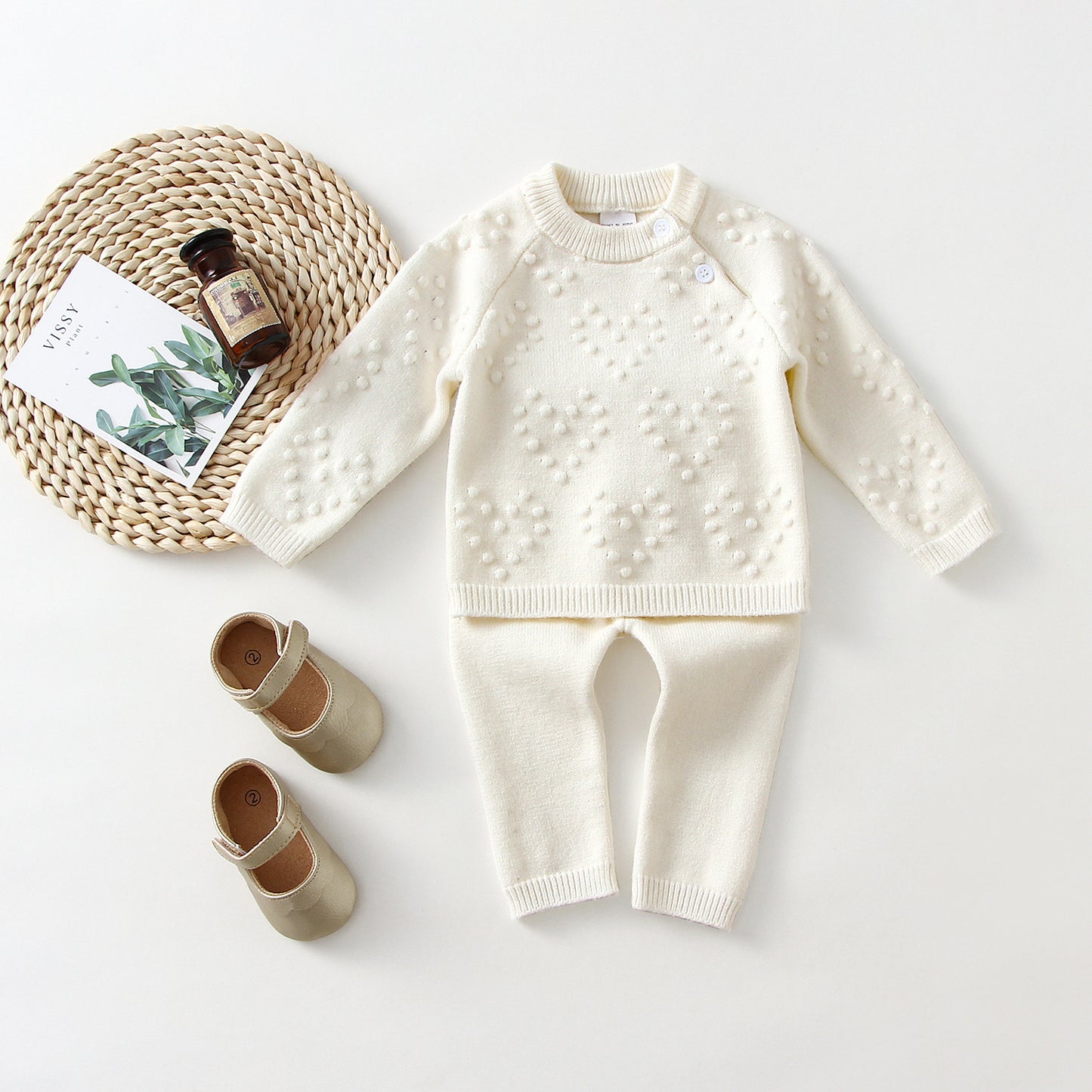 Côte & Crown children's knitted sweater set in cream with textured heart pattern and matching knit pants