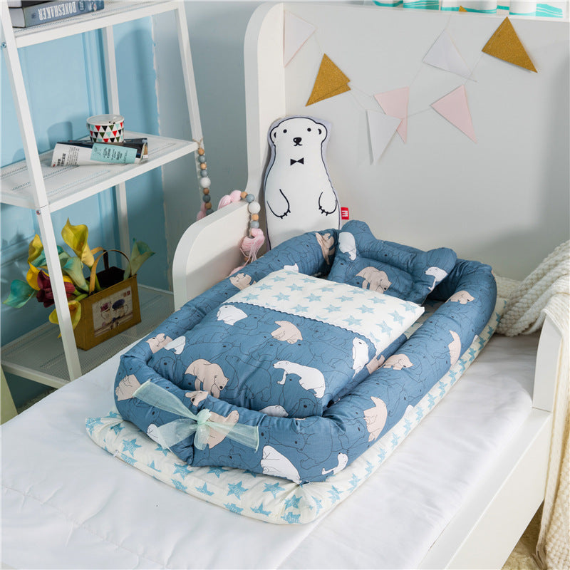 New-born foldable middle bed baby infant with blue animal print and soft cushion by Côte & Crown