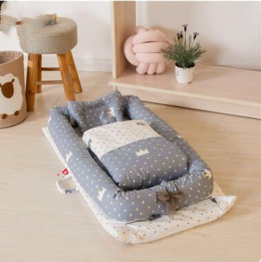 Côte & Crown new-born foldable middle bed baby infant in grey with star pattern on wooden floor