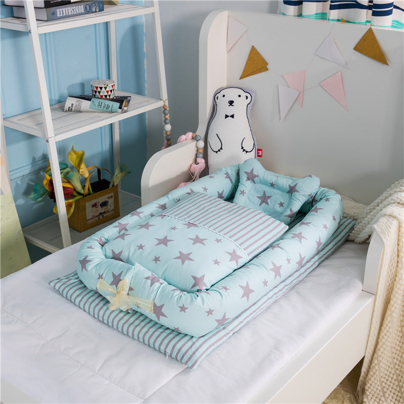 New-born foldable middle bed baby infant with star pattern in light blue by Côte & Crown on white toddler bed