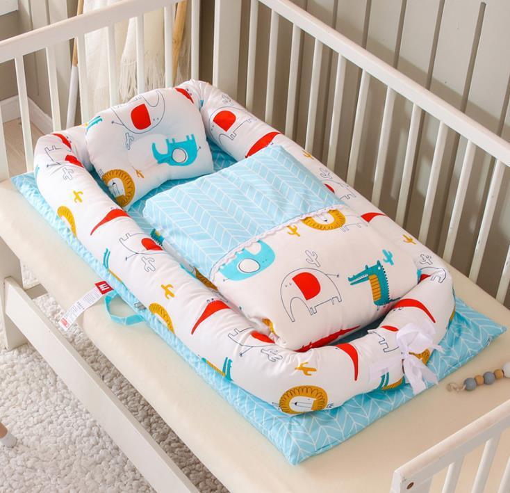 Côte & Crown newborn foldable middle bed baby infant with colorful animal print and blue cushion