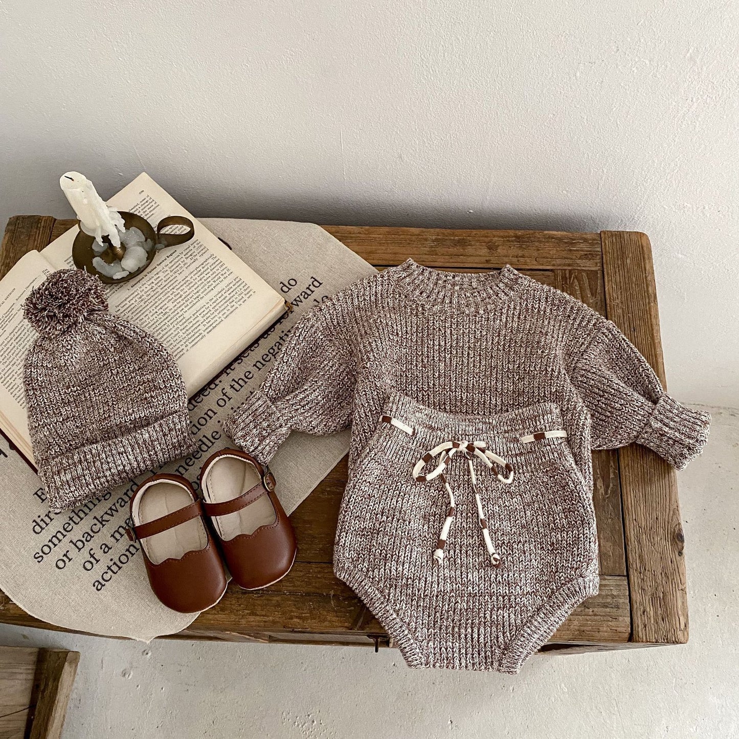 Côte & Crown baby clothes set with knitted sweater, matching bottoms with drawstring, pom pom hat, and brown baby shoes