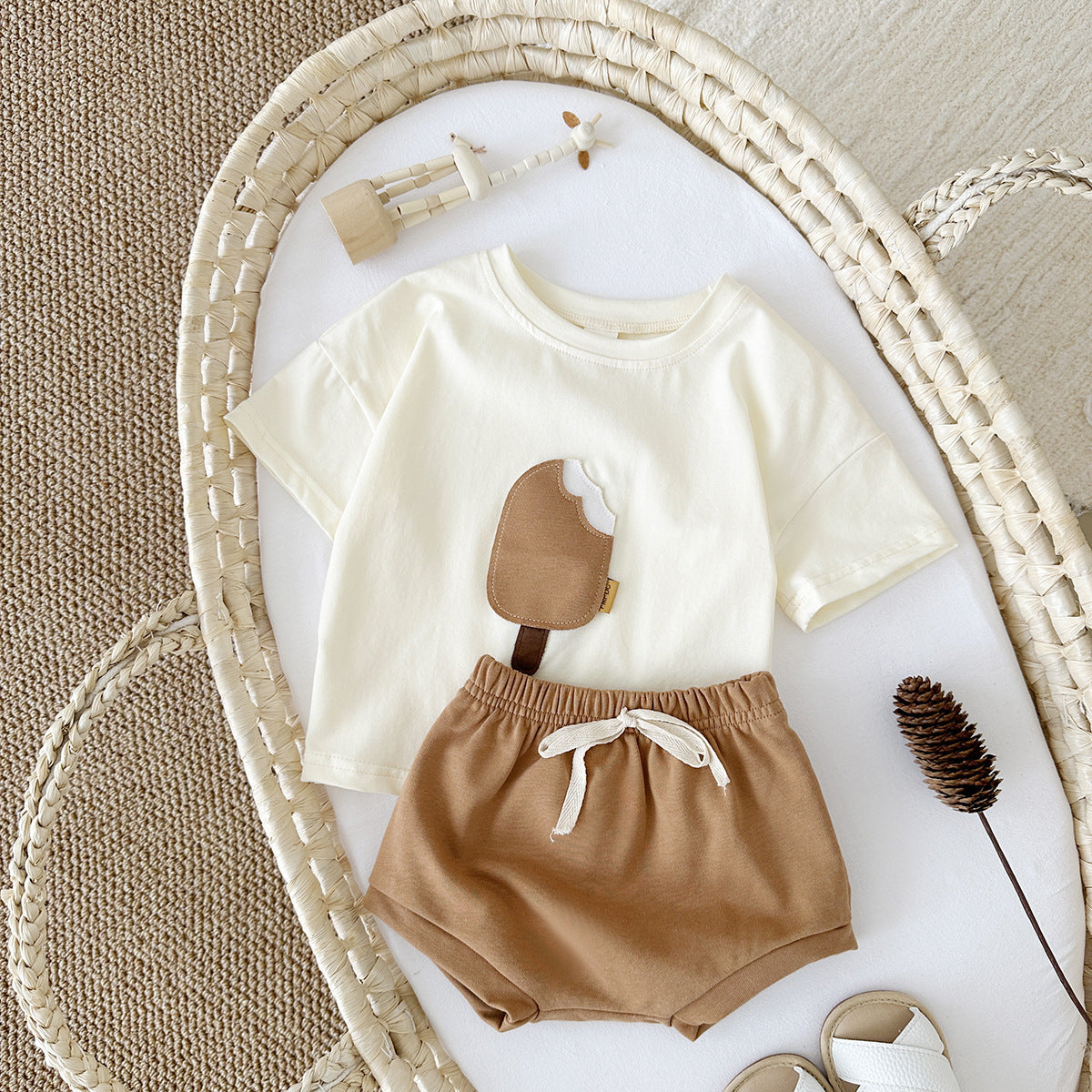 Côte & Crown baby clothes set with cream t-shirt featuring ice cream applique and brown shorts with drawstring