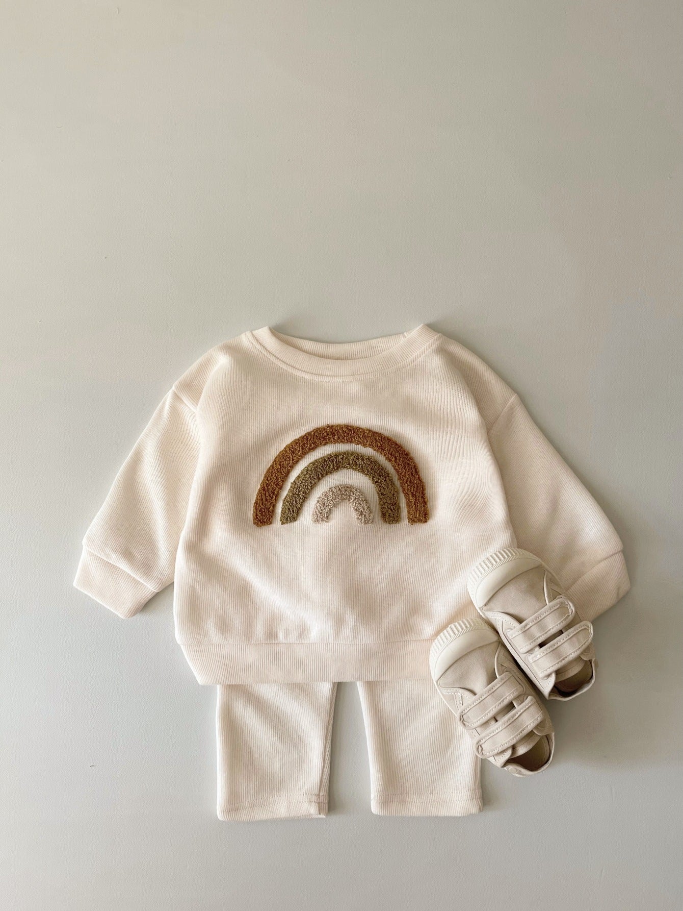 Côte & Crown embroidered baby long sleeve two-piece autumn baby clothes set with rainbow design and matching cream shoes