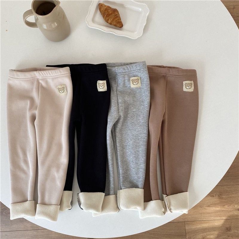 Côte & Crown baby clothes ribbed leggings in beige black gray and brown with bear patches on white table
