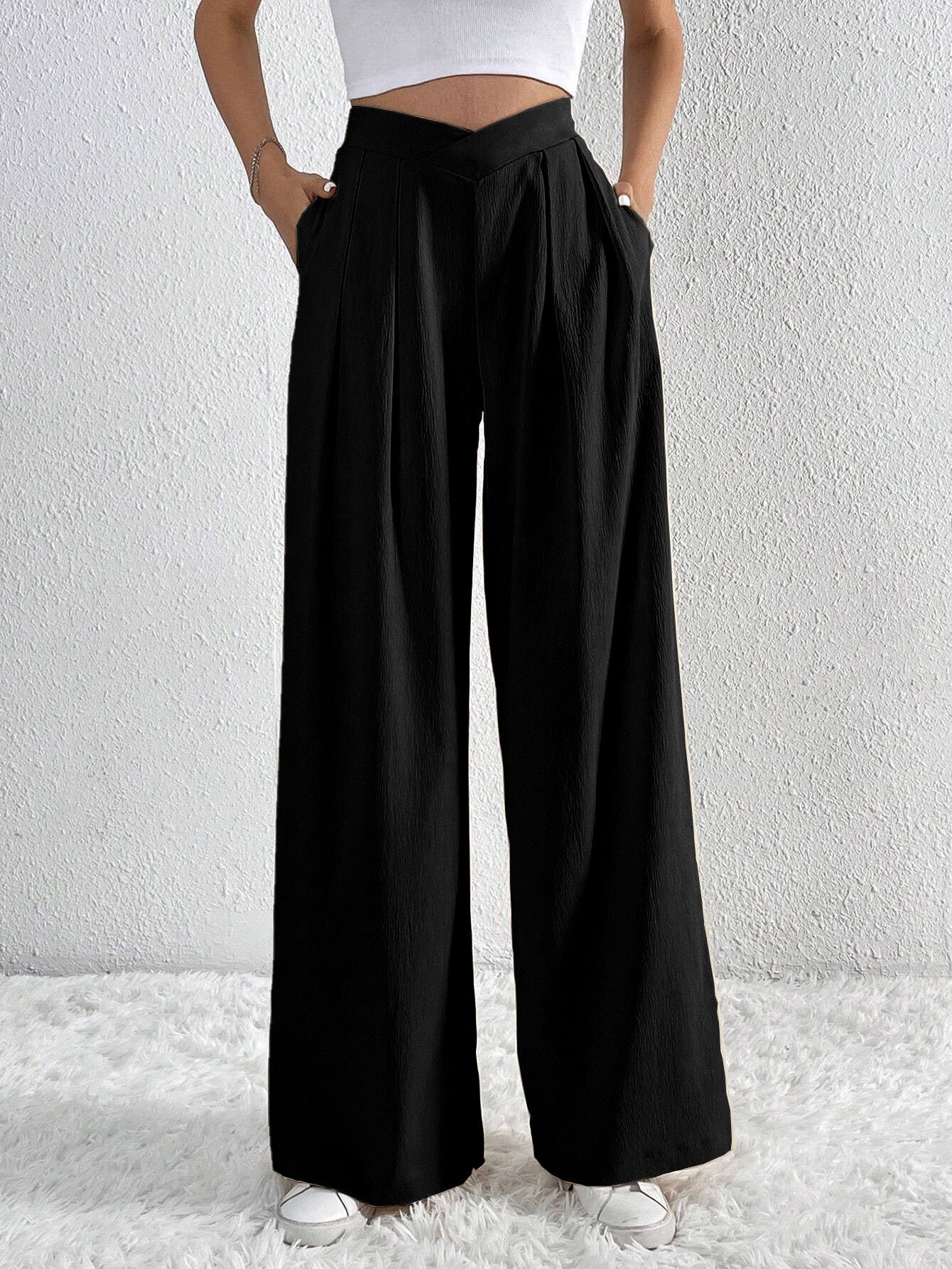 Côte & Crown womens black wide leg trousers with high waist and pockets styled with white crop top