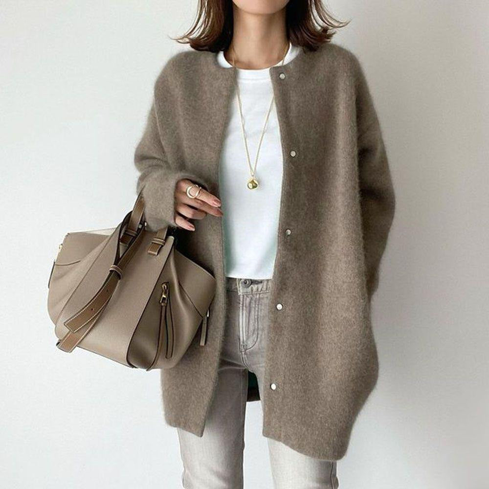 Hauteloom Oversized Brown Cardigan with Buttons, worn over a white t-shirt and paired with a stylish handbag