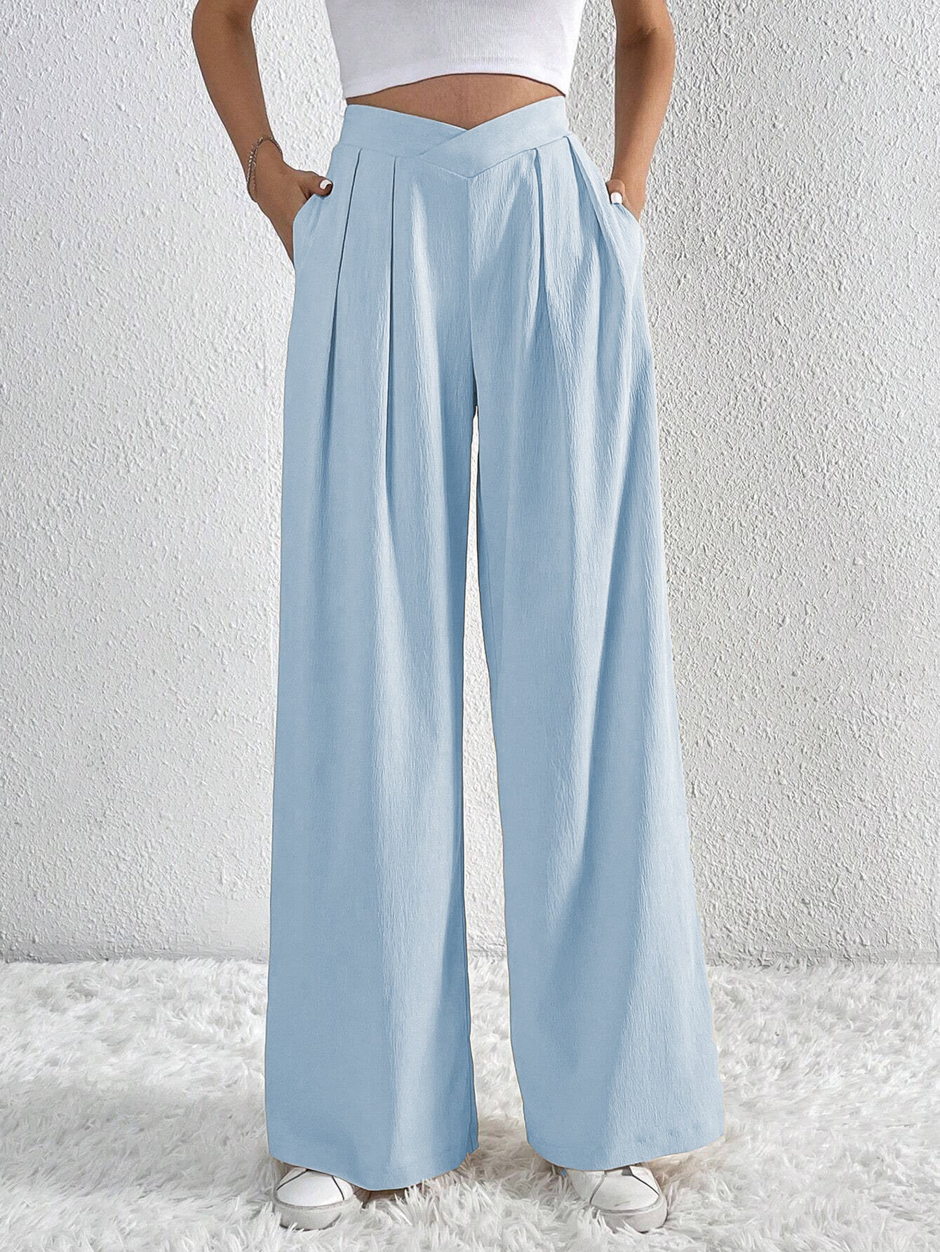 Côte & Crown women's light blue wide-leg trousers with pleats and pockets