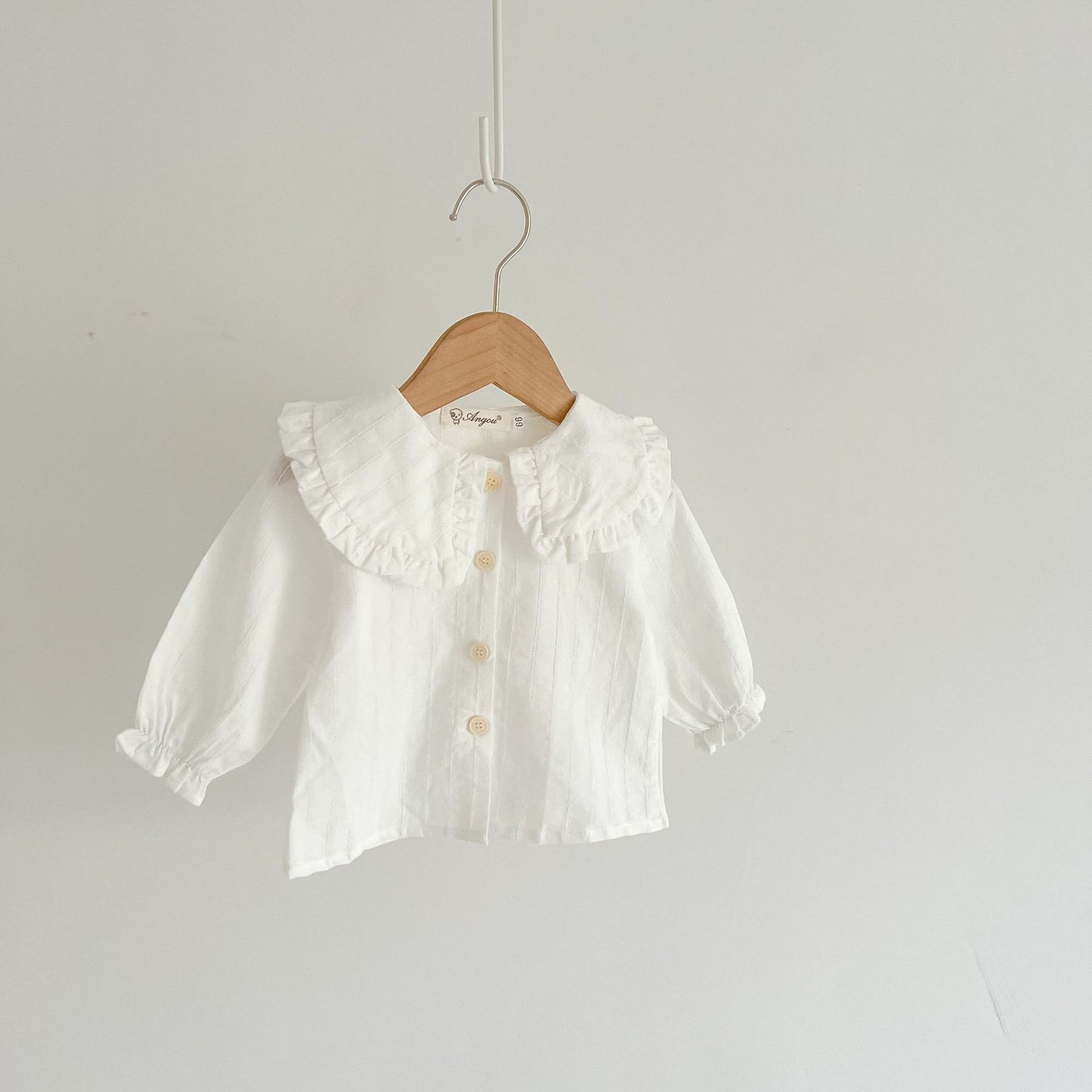 Côte & Crown white baby girl blouse with ruffled collar and buttons luxury baby girl outfit affordable