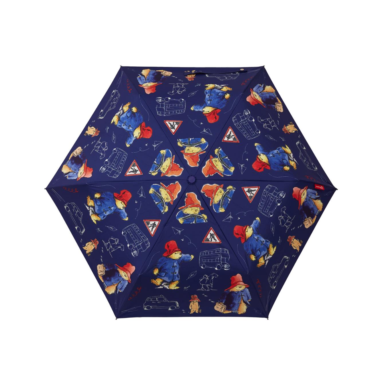 Paddington Bear umbrella featuring vibrant illustrations on a blue background