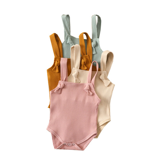 Côte & Crown soft cotton romper for babies in pink beige mustard and green with shoulder straps
