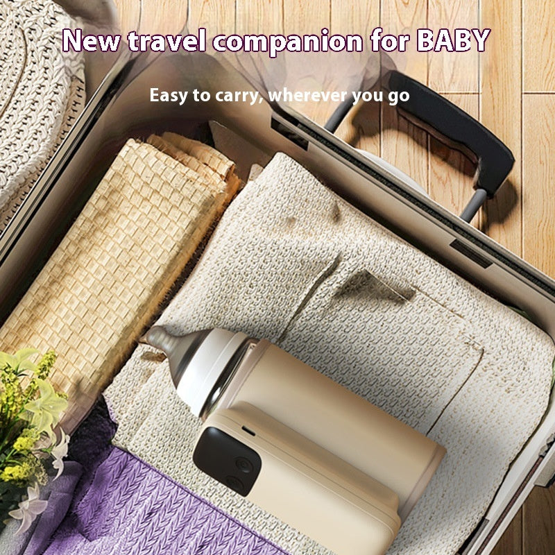 Côte & Crown portable baby bottle warmer packed in suitcase with cozy clothing for travel