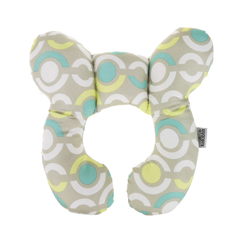 Côte & Crown U-Shaped Neck Guard Pillow for Stroller with colorful circular pattern