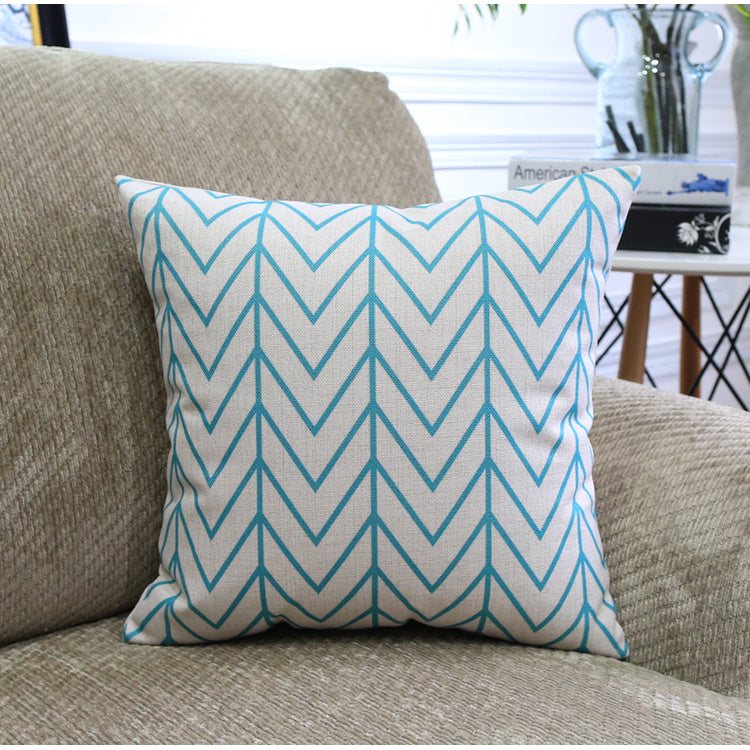 Côte & Crown blue chevron patterned decorative cushion on beige sofa soft furnishing