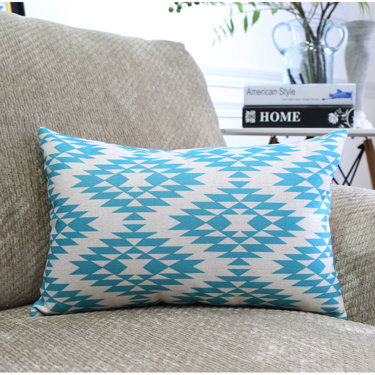 Côte & Crown turquoise geometric pattern soft furnishing cushion on beige sofa