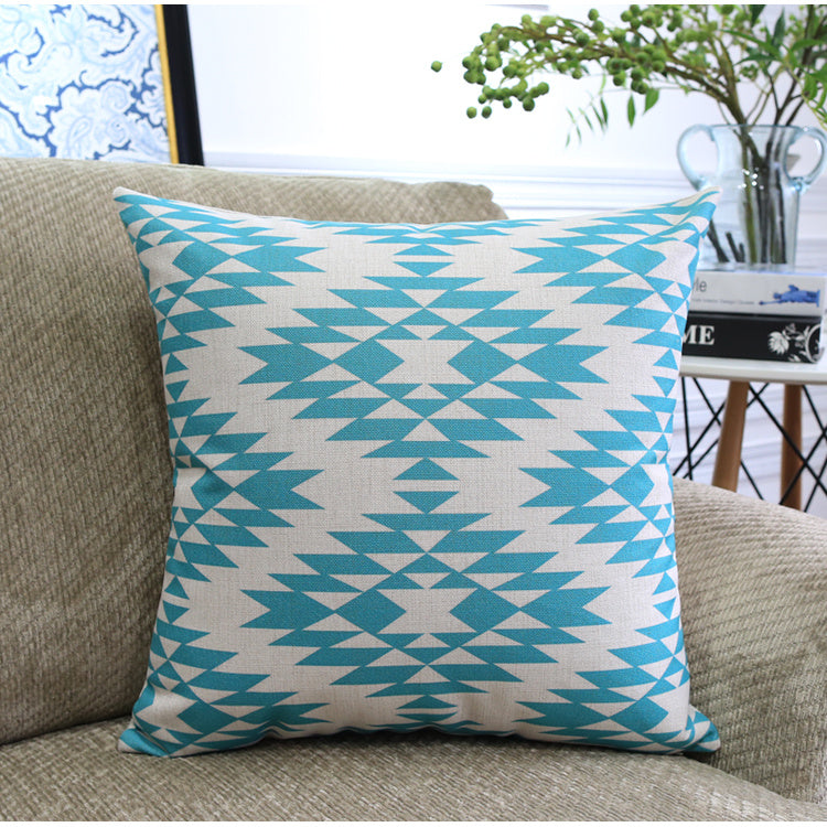 Côte & Crown soft furnishing square cushion with blue geometric pattern on beige fabric