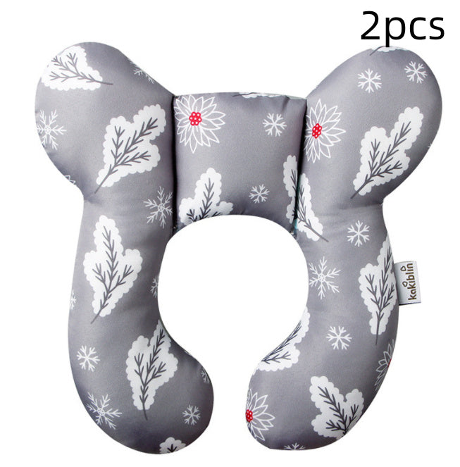 Gray U-shaped neck guard pillow for stroller with white leaf and snowflake patterns by Côte & Crown