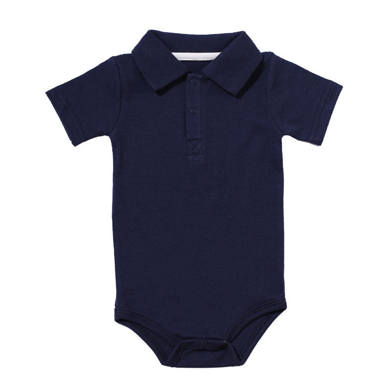 Côte & Crown navy blue baby onsie with collar and short sleeves made from soft fabric