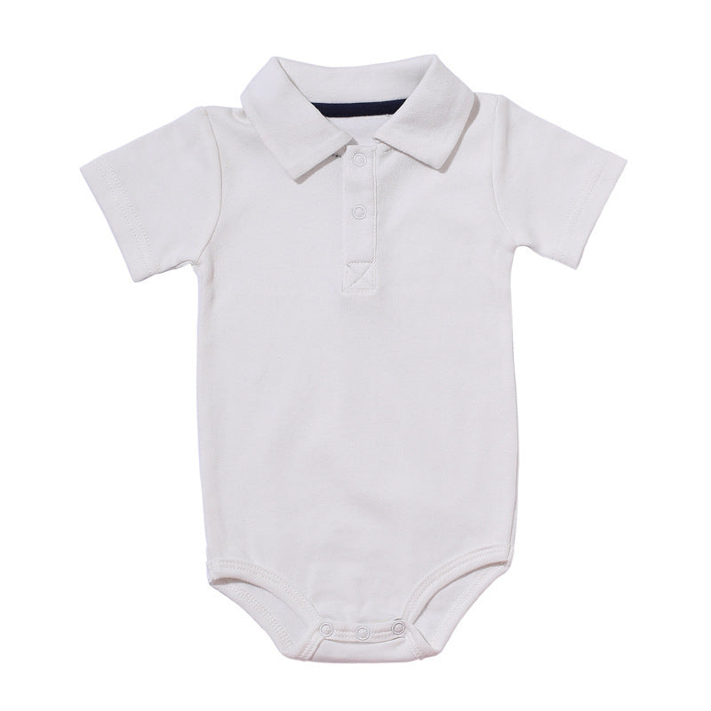 White baby onsie with collar and short sleeves by Côte & Crown with front buttons and snap closure