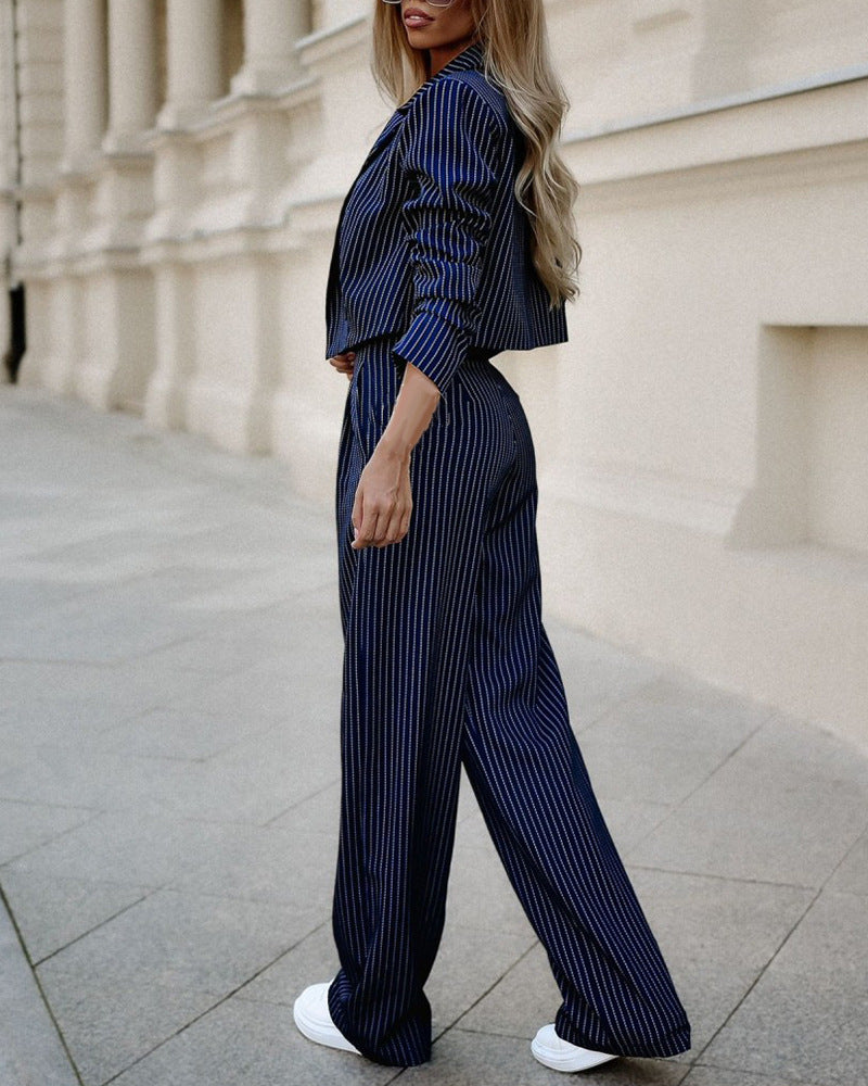  women's striped office suit featuring a cropped jacket and wide-leg trousers in navy